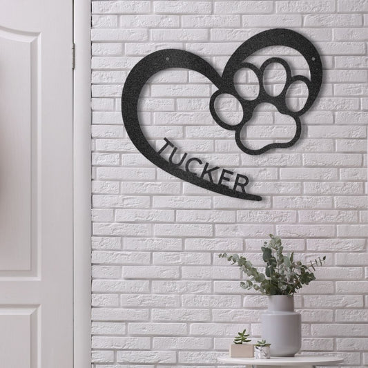 Custom Metal Wall Art for Dog & Cat Lovers and Personalized Pet Name Decor lifestyle mockup in black with the name "Tucker" incorporated into the design.