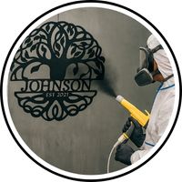 A custom steel sign being powder coated for maximum durability and rust protection against elements both indoor and outdoor.