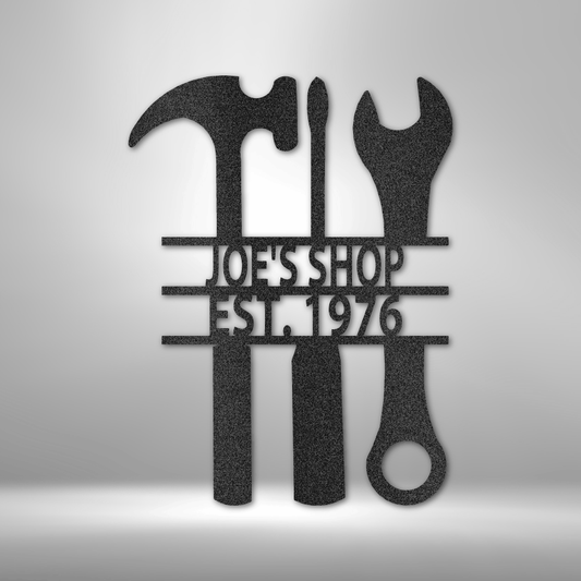 Custom tool shop steel sign with hammer, screwdriver, wrench, and personalized text, made in USA