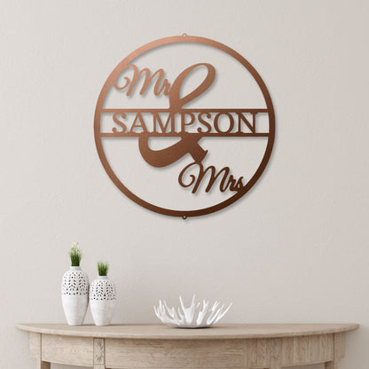 Mr and Mrs Circle steel sign in copper finish displayed indoors