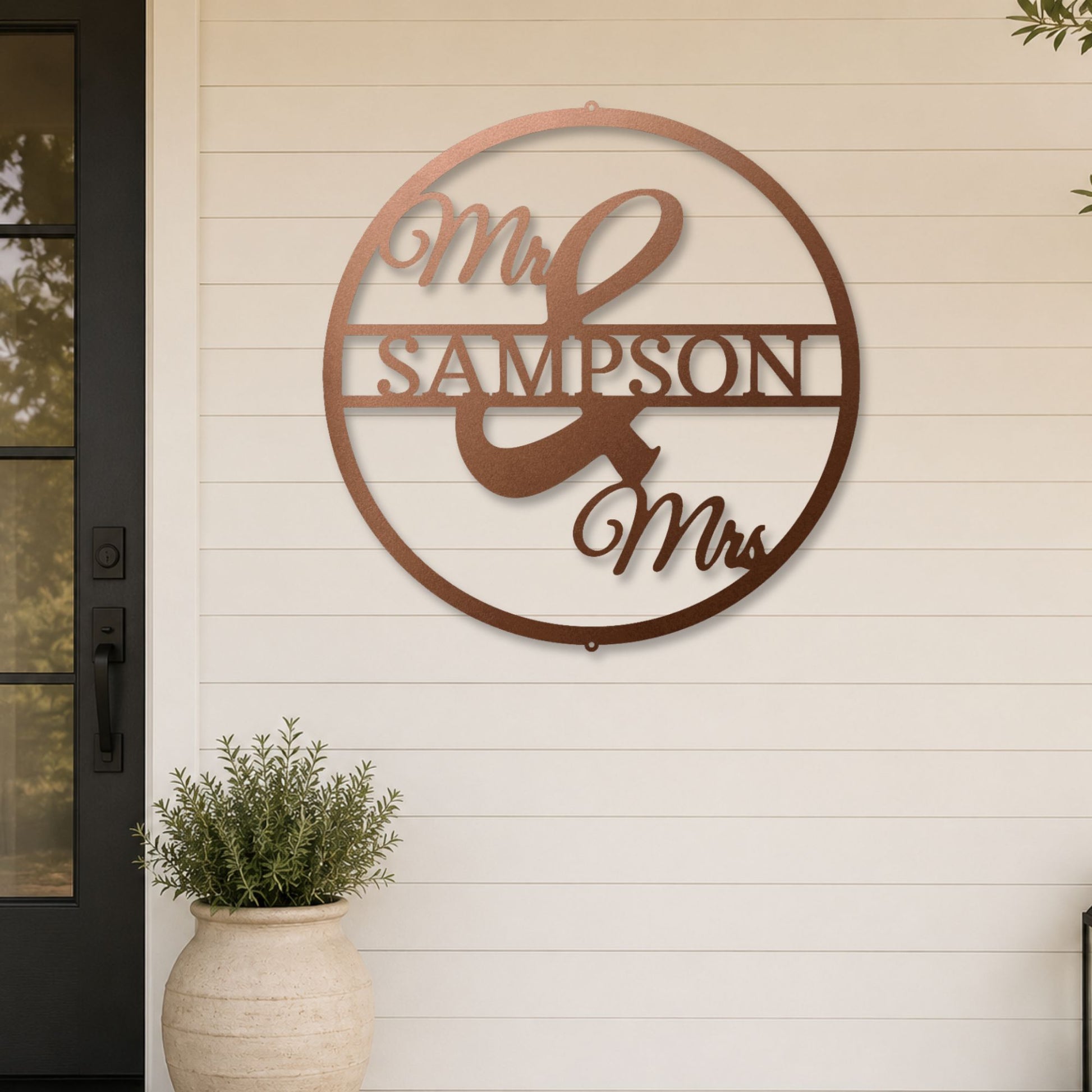 Mr and Mrs Circle steel sign in copper finish displayed outdoors